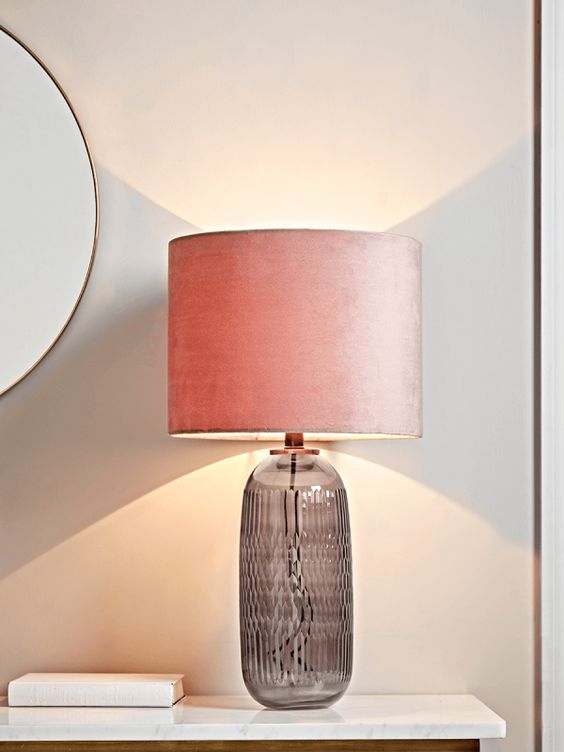 Textured table lamp with pink shade