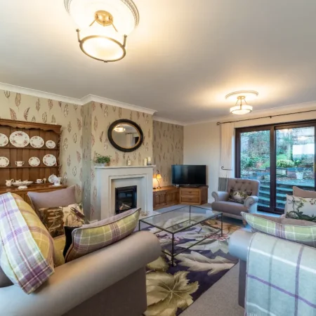 Bespoke furniture and bespoke window treatments with designer wallpaper
